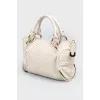 Dairy leather bag with golden fittings