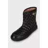 Black ugg boots with gold logo