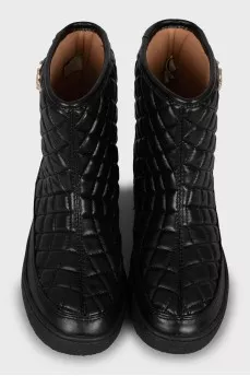 Black ugg boots with gold logo