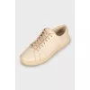 Beige leather sneakers