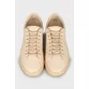 Beige leather sneakers