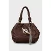 Leather bag decorated with chain