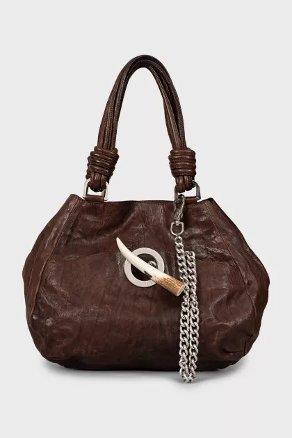 Leather bag decorated with chain