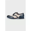 Brogues made of textile and leather