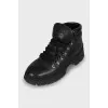 Black leather lace-up boots