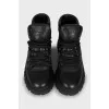 Black leather lace-up boots