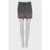 Mini skirt with ripped effect