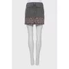 Mini skirt with ripped effect