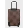 Suitcase with branded print