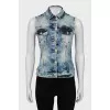 Denim vest with crystals on the back