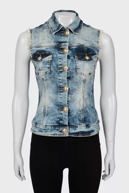 Denim vest with crystals on the back