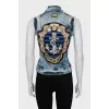 Denim vest with crystals on the back