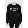 Black sweatshirt with white print