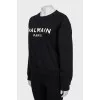 Black sweatshirt with white print