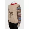 Knitted sweater with a loose fit