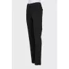 Tapered trousers with a mid-waist