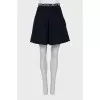 Blue skirt with brand logo