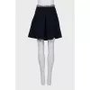 Blue skirt with brand logo