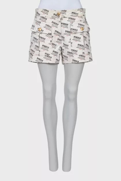 White shorts with signature print