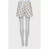 White shorts with signature print