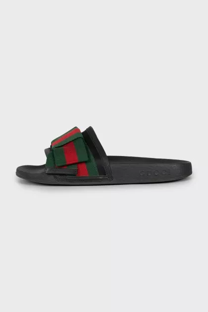 Slippers with textile decor