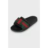 Slippers with textile decor