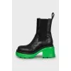Leather boots with accent sole