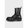 Leather boots decorated with lacing