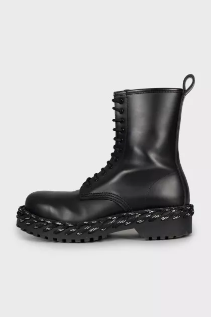 Leather boots decorated with lacing