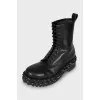Leather boots decorated with lacing