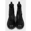Leather boots decorated with lacing