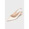 White leather slingbacks