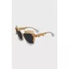 Sunglasses with metallic flowers