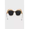 Sunglasses with metallic flowers
