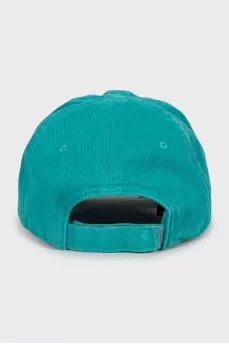 Turquoise cap with embroidery