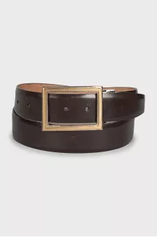 Men's belt with a shaped buckle
