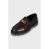 Brown leather loafers