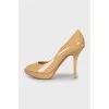 Patent leather high heel shoes