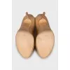 Patent leather high heel shoes