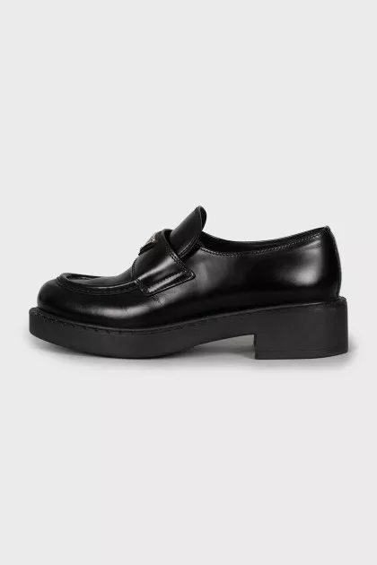 Leather loafers with metal decor