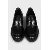 Leather loafers with metal decor