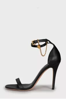 Leather sandals with golden skulls