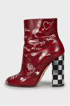 Leather ankle boots decorated with inscriptions