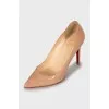 Patent leather shoes made of beige leather