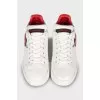 Leather sneakers decorated with a patch