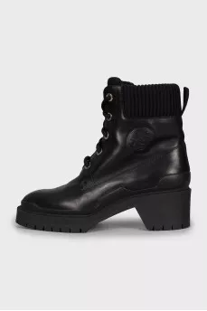 Black leather lace-up boots