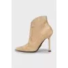 Ankle boots with a square back