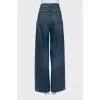 Wide leg jeans with distressed effect