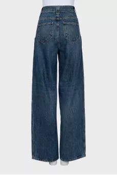Wide leg jeans with distressed effect