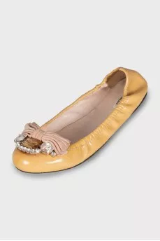 Yellow ballet flats with rhinestones
